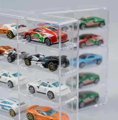 A clear acrylic toy car display organizer holding multiple miniature die-cast sports cars, including a red race car, a black and white patterned car, and several other colorful cars in the background.